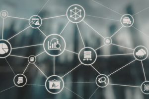 Abstract network diagram with white circular icons connected by lines, representing data, servers, and cloud systems on a blurred blue background.